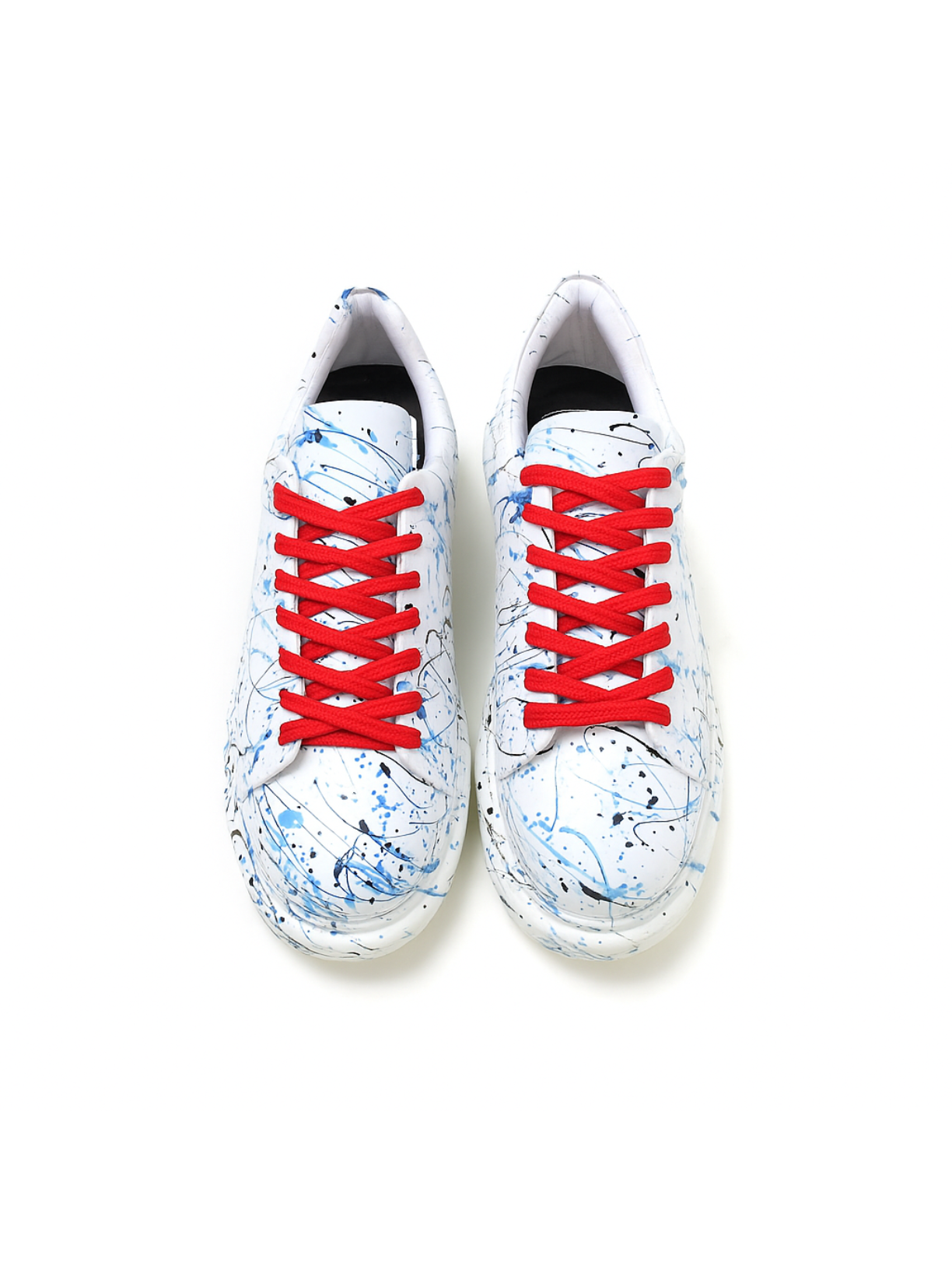 Pair of sneakers with red laces on a white background